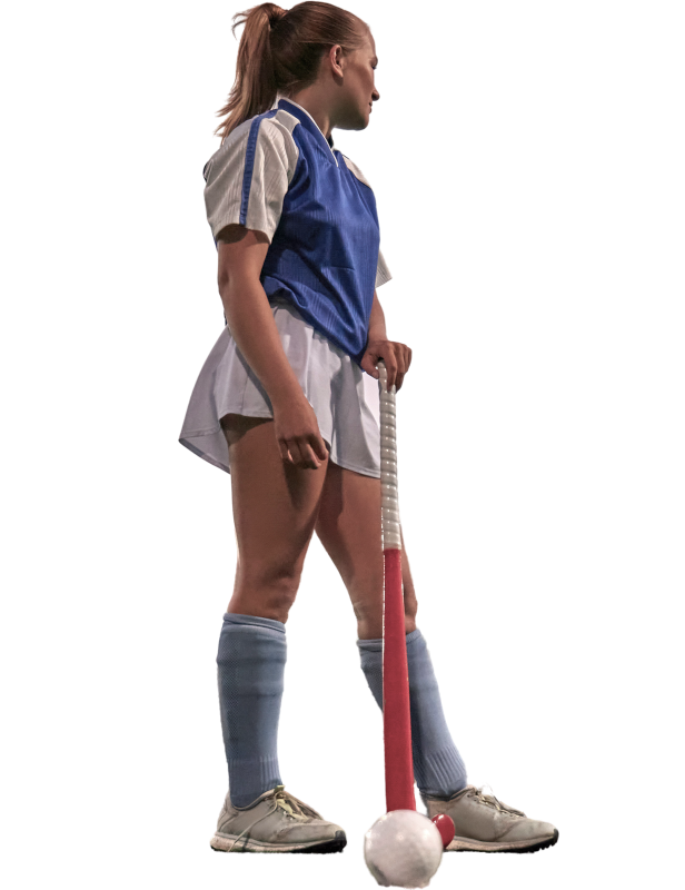 Een hockeyster die opzij kijkt.